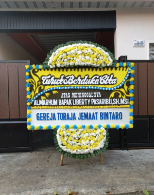 Papan Bunga Duka di Mayura